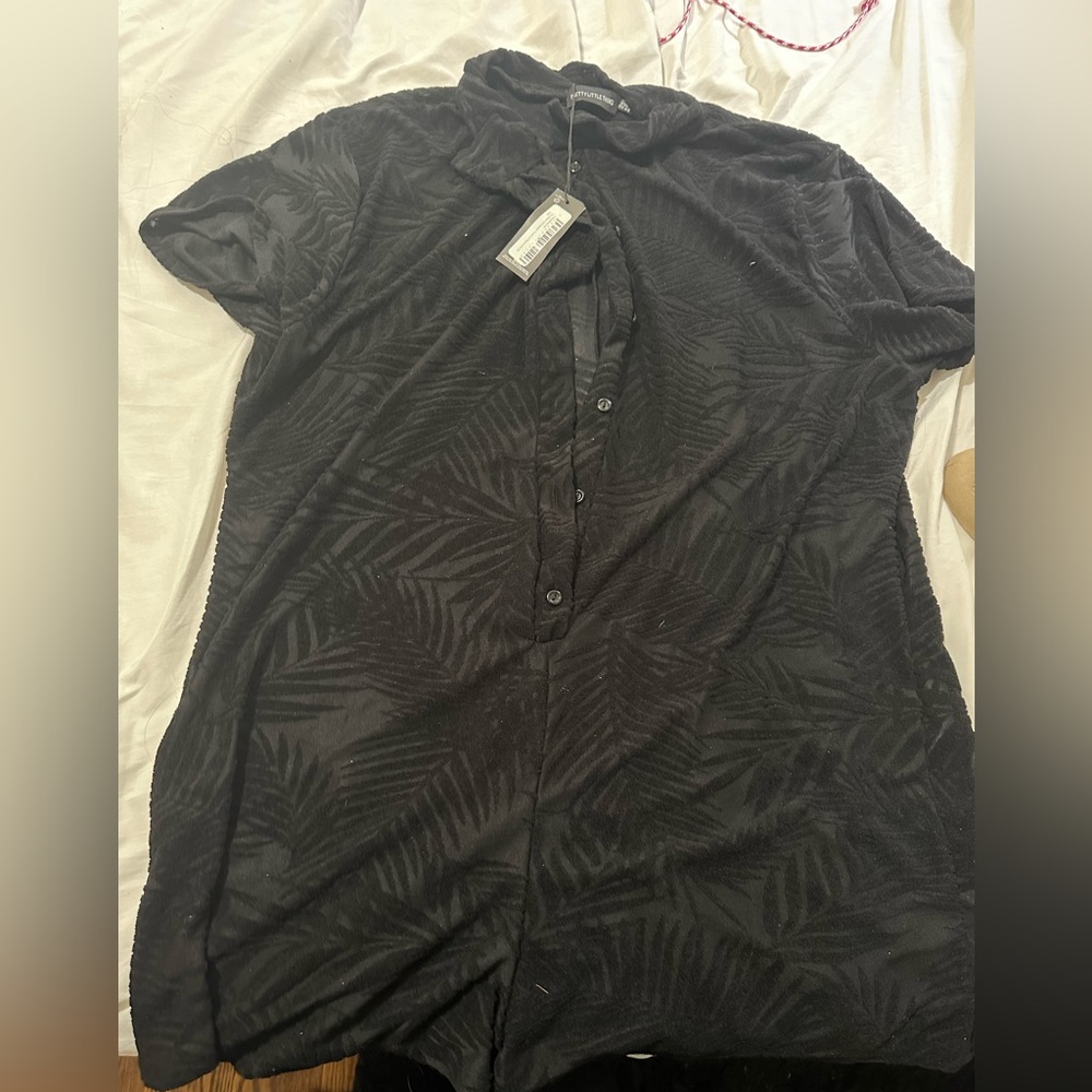 Black romper from Pretty Little Thing